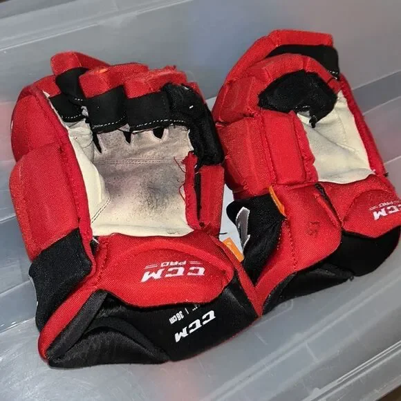 CCM authentic Carolina Hurricanes game worn used Ice Hockey Gloves Morgan Geekie